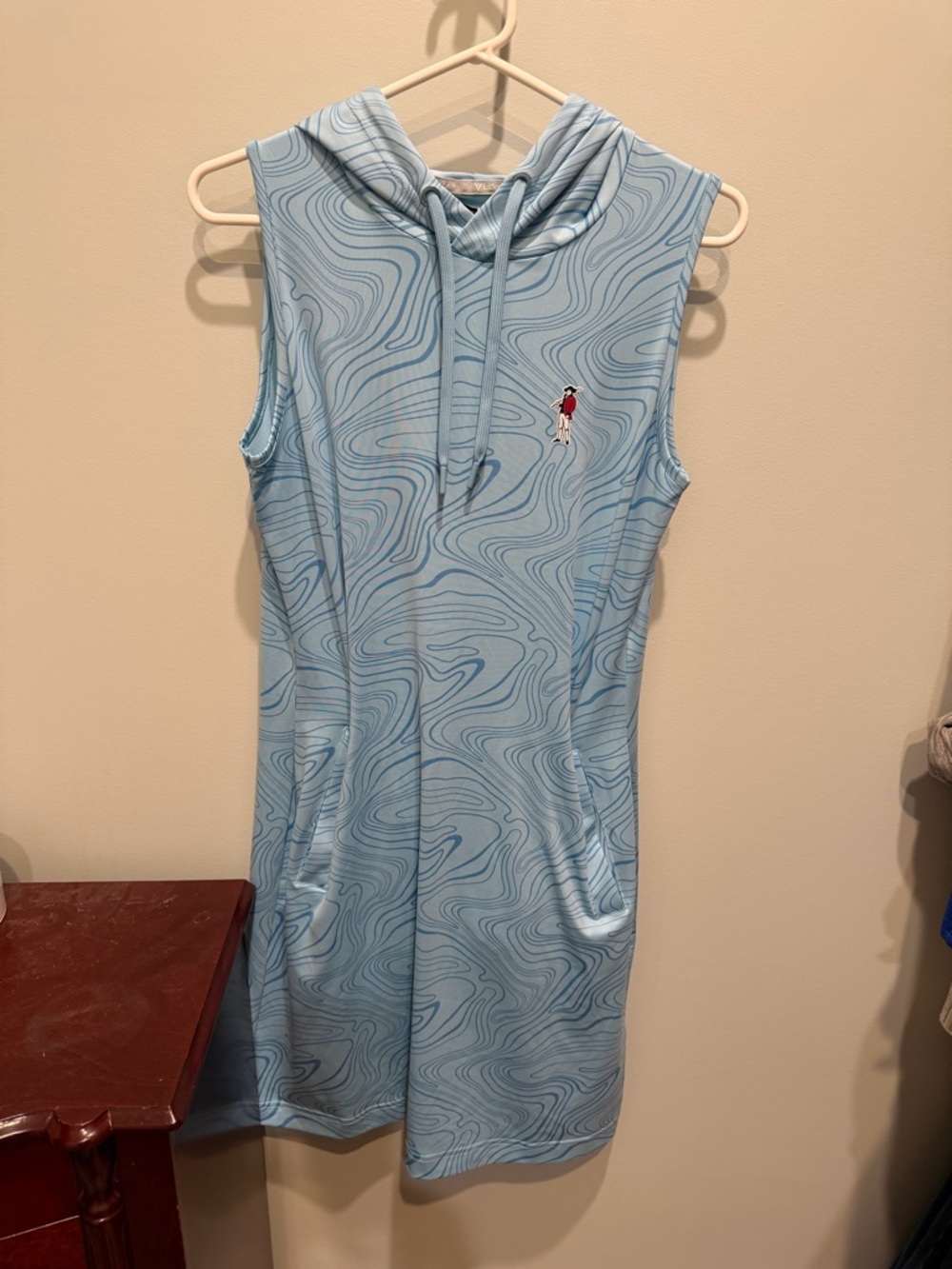 Light Blue Sleeveless Hooded Dress with Subtle Wave Print